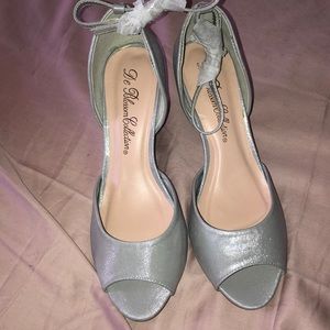 Size 8 silver wedges from David’s bridal. NWOT